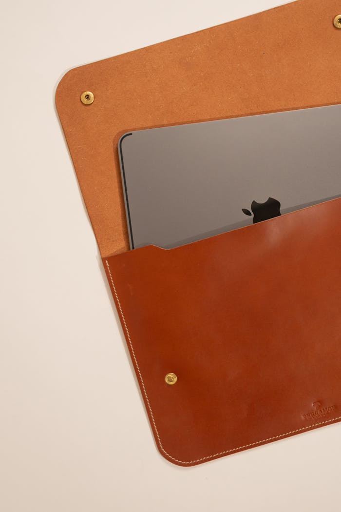 Elegant leather sleeve showcasing a stylish electronic device.