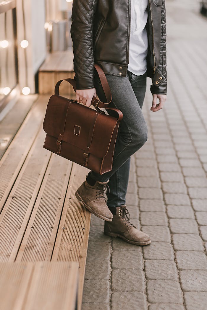 gallery-3 Chic urban style with a premium leather briefcase carried by a fashionable person standing on a city street.