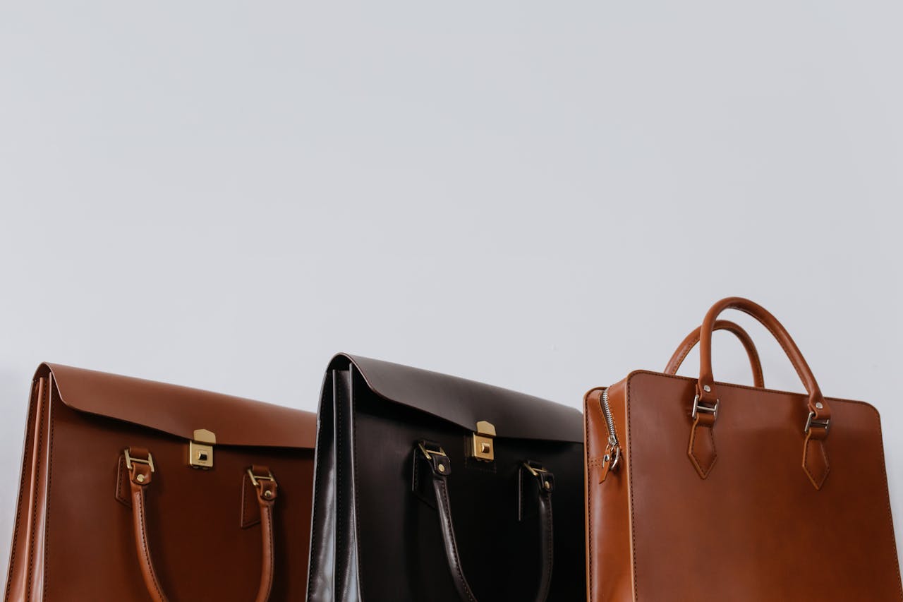 Crafting Captivating Headlines: Your awesome post title goes here A close-up view of three elegant leather briefcases emphasizing luxury and fashion.